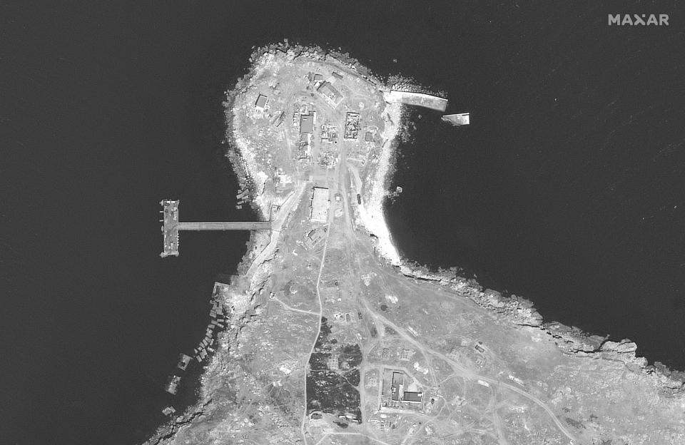 This WorldView-1 satellite black and white image from Maxar Technologies shows the northern end of Snake Island with burn marks in the Black Sea, on Tuesday, June 21, 2022. (Satellite image ©2022 Maxar Technologies via AP)