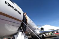 Bombardier Aviation spokesperson Mark Masluch exits the Bombardier Global 6500 business jet at the National Business Aviation Association (NBAA) exhibition in Las Vegas