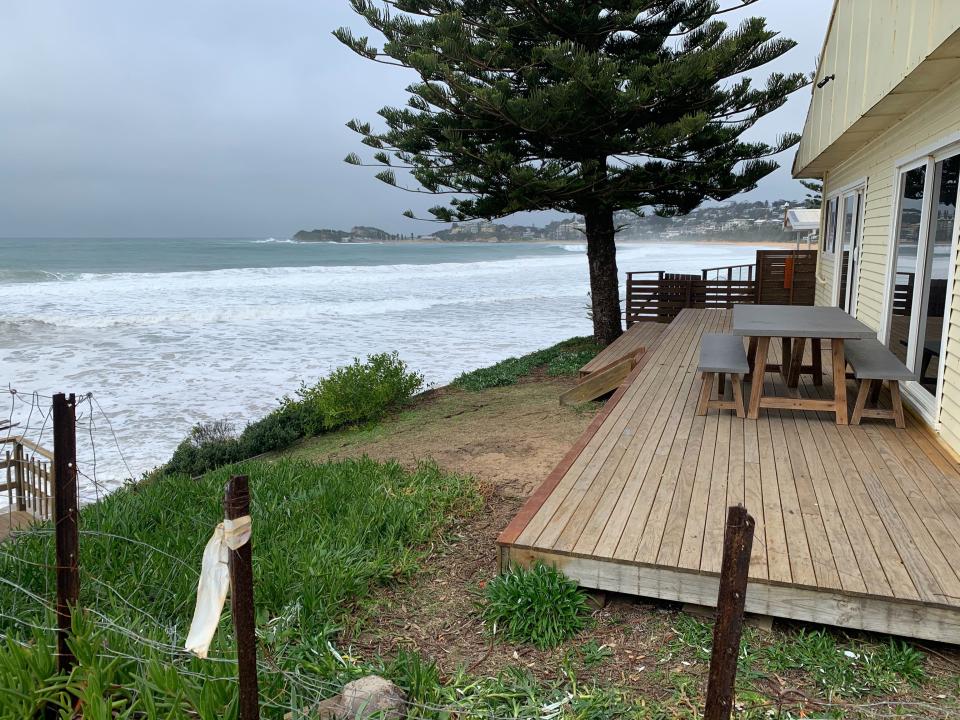 Pictured is the back of a Wamberal Beach home on the edge of the eroded dune.