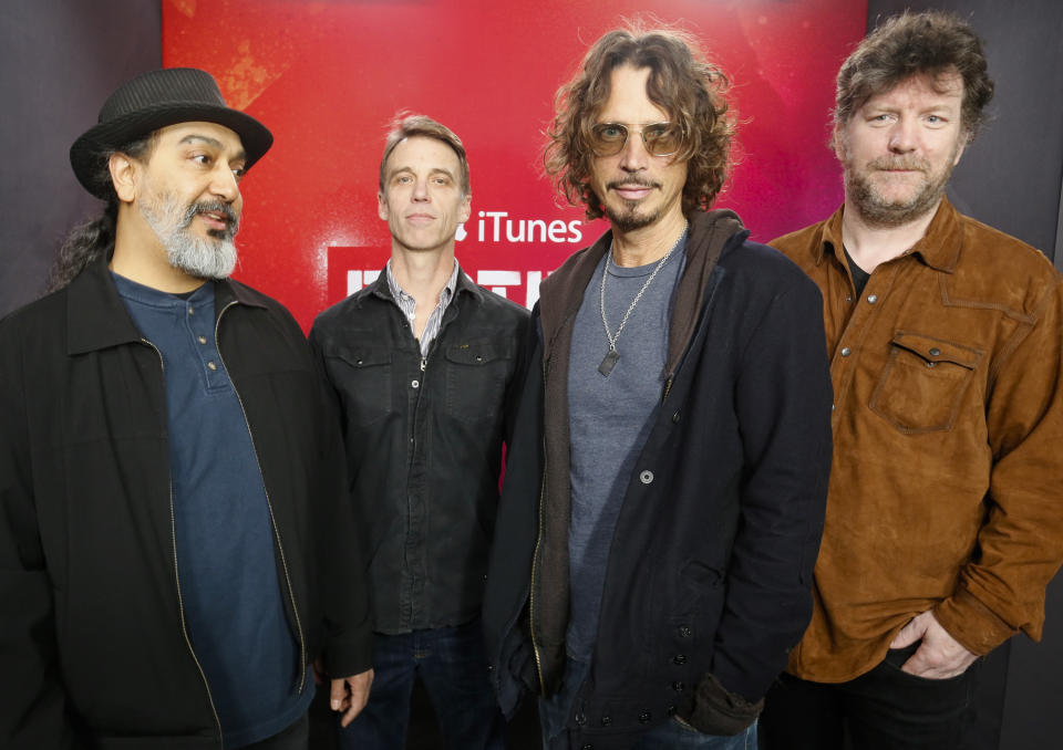 FILE - Members of Soundgarden, from left, Kim Thayil, Matt Cameron, Chris Cornell and Ben Shepherd appear at the iTunes Festival showcase during the SXSW Music Festival in Austin, Texas on March 13, 2014. The widow of singer Cornell and his former bandmates in Soundgarden said Monday that they have resolved her lawsuit against them, clearing the way for the release of the band's final recordings more than five years after his death. (Photo by Jack Plunkett/Invision/AP, File)