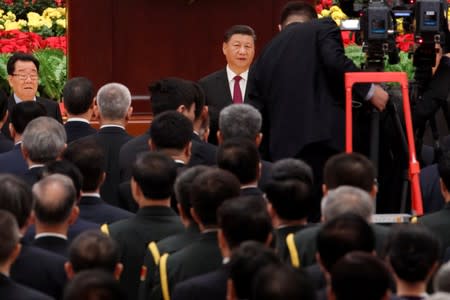 Chinese President Xi Jinping attends a reception at the Great Hall of the People marking the 70th anniversary of the founding of the People's Republic of China in Beijing