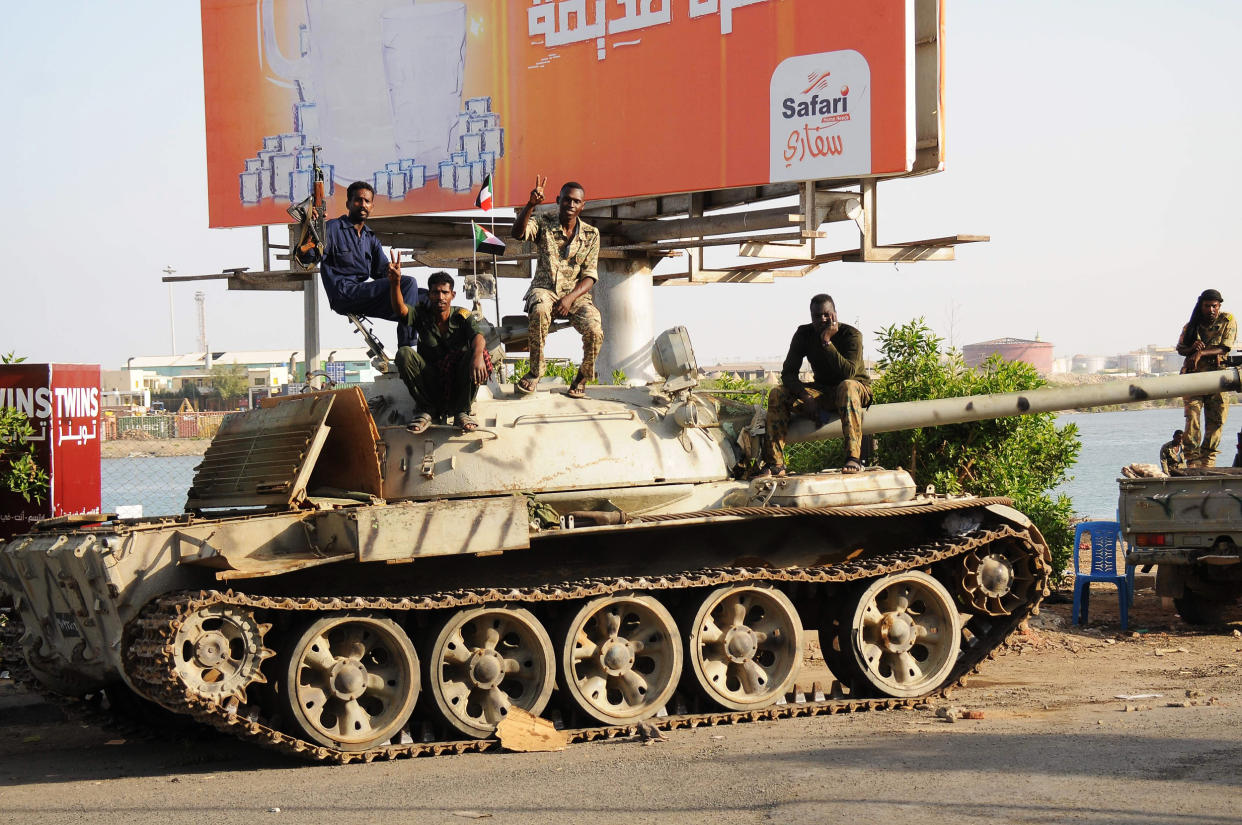 Sudanese army soldier sit atop a tank in the Red Sea city of Port Sudan (AFP via Getty Images)