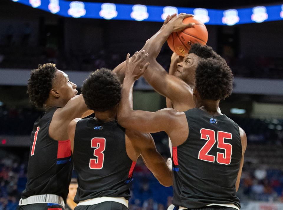 Westlake's KJ Adams goes up for a shot amid three Duncanville defenders during the 2021 Class 6A boys state championship game at the Alamodome. Adams' commitment to Kansas took Jayhawks coach Bill Self by surprise, but he wasn't complaining. "And what a blessing it's been," Self said.