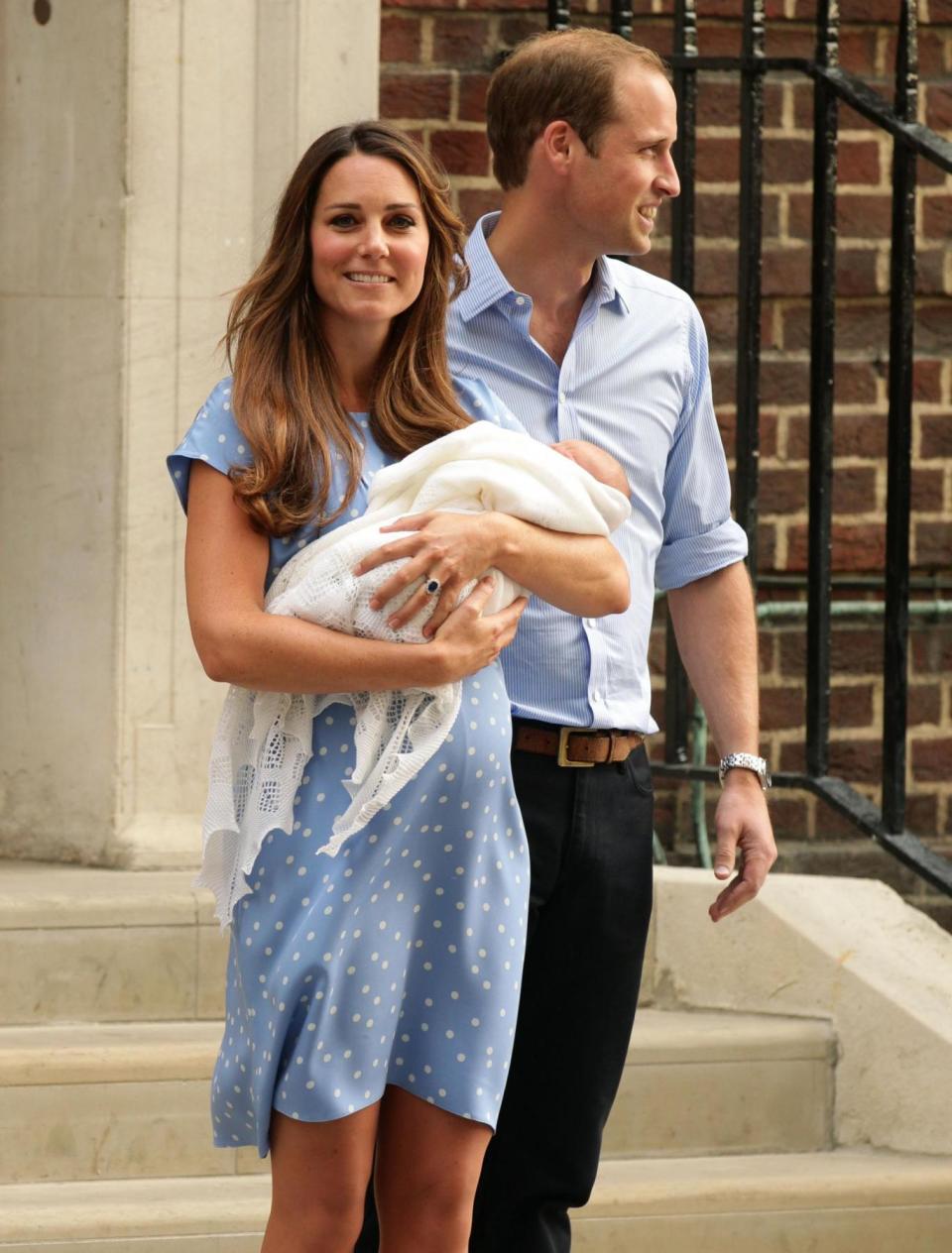 The Duke and Duchess of Cambridge leave the Lindo Wing with their newborn son, Prince George of Cambridge. (PA Archive/PA Images)