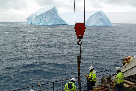 Researchers aboard the R/V Marion Dufresne II recover sediment cores analyzed in the study.