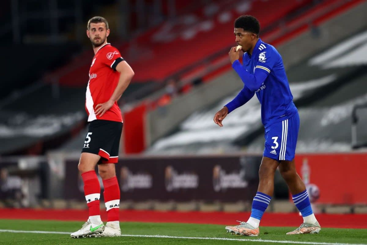 Muslim players like Wesley Fofana (right, breaking his fast during a match while a Leicester player in April 2021) will be allowed to eat and drink during a natural pause in play  (POOL/AFP via Getty Images)
