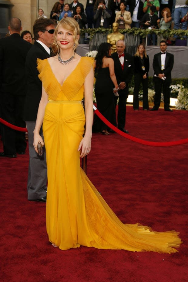 <p>Williams was nominated for (but didn't win) Best Actress in a Supporting Role for <em>Brokeback Mountain</em> at the 78th Academy Awards. But she stole the spotlight in an unforgettable yellow Vera Wang gown with gorgeous draping and short ruffled sleeves.</p>