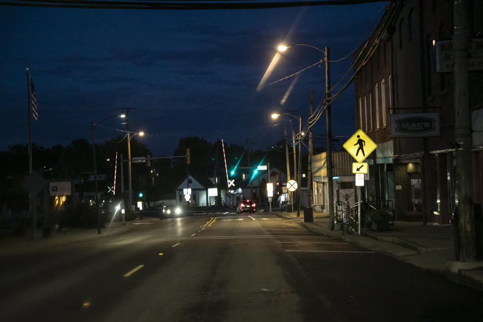 Dusk settles over Anna, Ill., on Saturday, Aug. 1, 2020. "Sundown towns" like Anna were places where Black people were allowed in during the day to work or shop but had to be gone by nightfall. Today, some still exist in various forms, enforced now by tradition and fear rather than by rules. (AP Photo/Wong Maye-E)