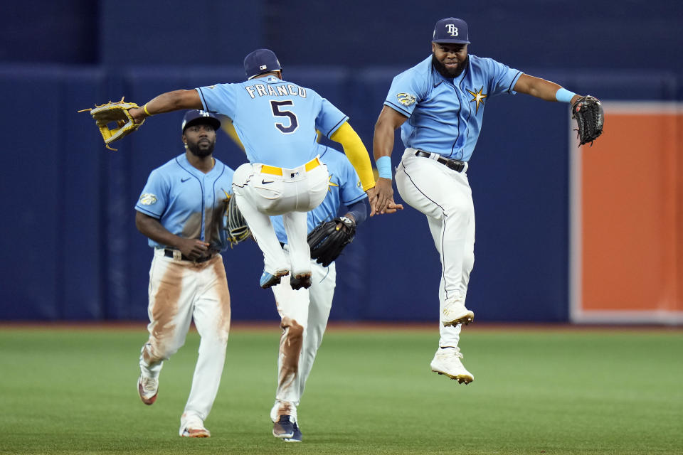 Tampa Bay Rays outfielder Manuel Margot celebrates with shortstop Wander Franco (5) after the Rays defeated the Boston Red Sox during a baseball game Monday, April 10, 2023, in St. Petersburg, Fla. (AP Photo/Chris O'Meara)