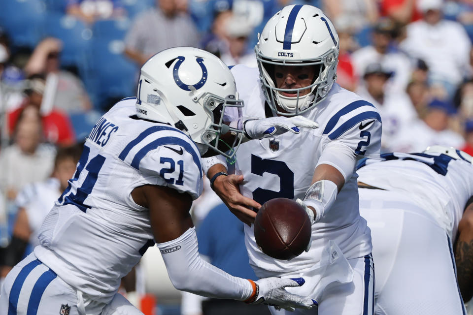 Indianapolis Colts quarterback Matt Ryan (2) hands off to running back Nyheim Hines (21) during the first half of a preseason NFL football game against the Buffalo Bills, Saturday, Aug. 13, 2022, in Orchard Park, N.Y. (AP Photo/Jeffrey T. Barnes)