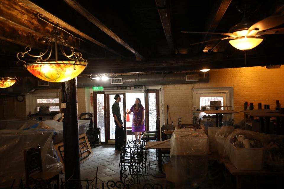 Bertha Gomez, right, and her son David Gomez, the new owners of La Golondrina Cafe, at famed closed restaurant in Olvera St.