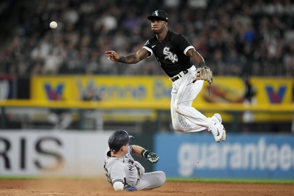 Chicago White Sox shortstop Tim Anderson forces New York Yankees' Harrison Bader out at second and gets Kyle Higashioka at first to turn the double play during the seventh inning of a baseball game, Wednesday, Aug. 9, 2023, in Chicago. (AP Photo/Charles Rex Arbogast)