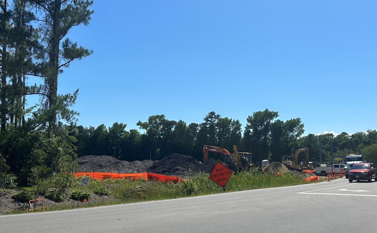 Crews work to prepare for construction at the future site of New Hanover County's fifth library branch, the Northchase branch. The location off North College Road on Northchase Parkway.