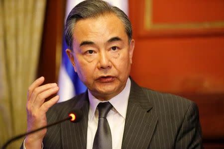 Chinese Foreign Minister Wang Yi answers media questions after signing agreements with his Uruguayan counterpart Rodolfo Nin Novoa at the Uruguayan foreign ministry in Montevideo, Uruguay January 24, 2018. REUTERS/Andres Stapff