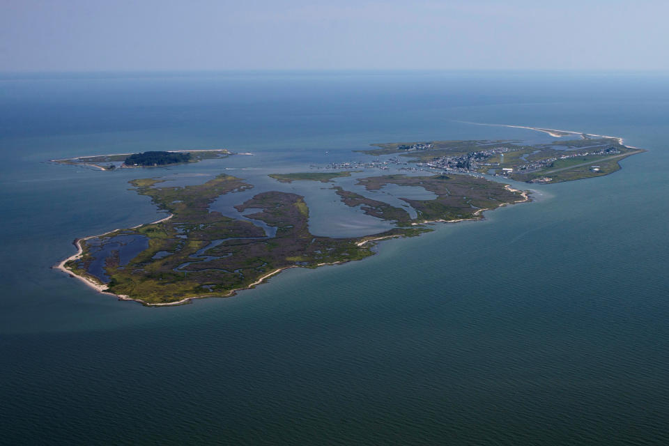 <p>Tangier Island is photographed from the north side in this aerial view over Chesapeake Bay, Virginia, Aug. 2, 2017. (Photo: Adrees Latif/Reuters) </p>