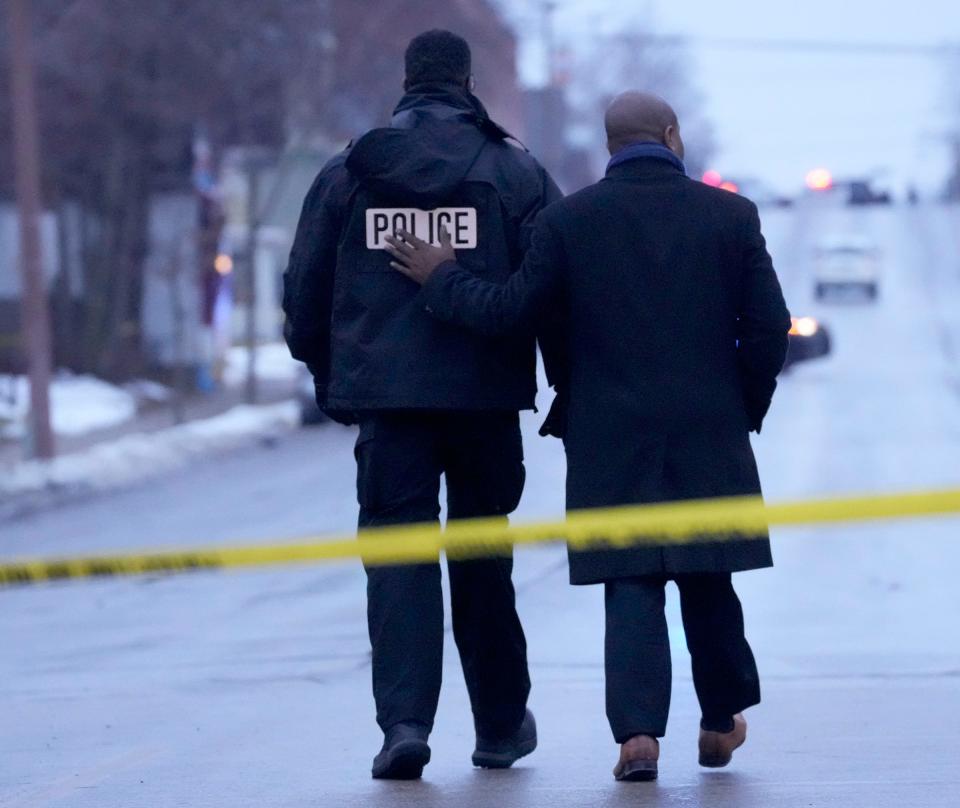 Milwaukee Mayor Cavalier Johnson, right, walks with Milwaukee Police Chief Jeffrey Norman after Norman briefed the media  regarding a fatal officer involved shooting near the intersection of South 13th Street and West Cleveland Avenue in Milwaukee.