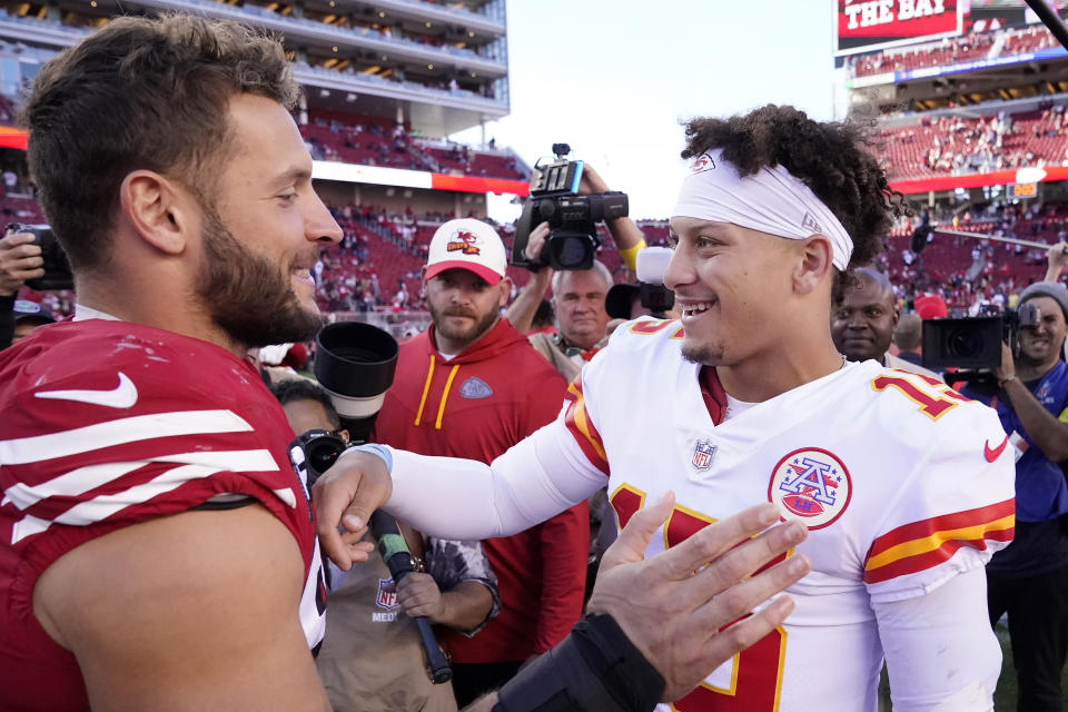 San Francisco 49ers defensive end Nick Bosa, left, greets Kansas City Chiefs quarterback Patrick Mahomes after an NFL football game in Santa Clara, Calif., Sunday, Oct. 23, 2022. (AP Photo/Godofredo A. Vásquez)