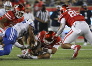 Houston quarterback Clayton Tune (3) fumbles but recovers the ball during the third quarter of an NCAA college football game against BYU Friday, Oct. 16, 2020, in Houston. (Yi-Chin Lee/Houston Chronicle via AP)