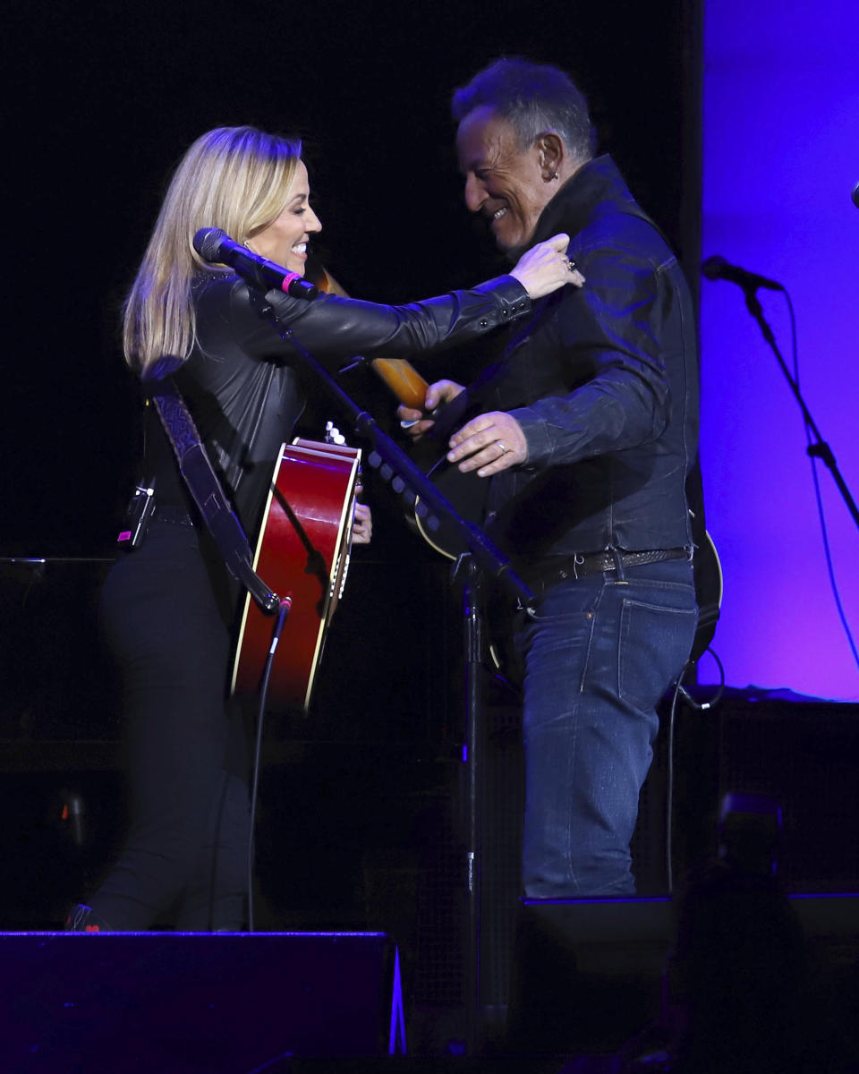 Sheryl Crow, left, and Bruce Springsteen perform at the 13th annual Stand Up For Heroes benefit concert in support of the Bob Woodruff Foundation at the Hulu Theater at Madison Square Garden on Monday, Nov. 4, 2019, in New York. (Photo by Greg Allen/Invision/AP)