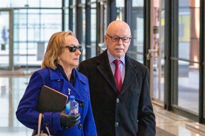 Former political insider Tim Mapes and his wife Bronwyn Rains exit the Dirksen Federal Courthouse in downtown Chicago on Monday after Mapes was sentenced to 30 months in prison for perjury and attempted obstruction of justice.
