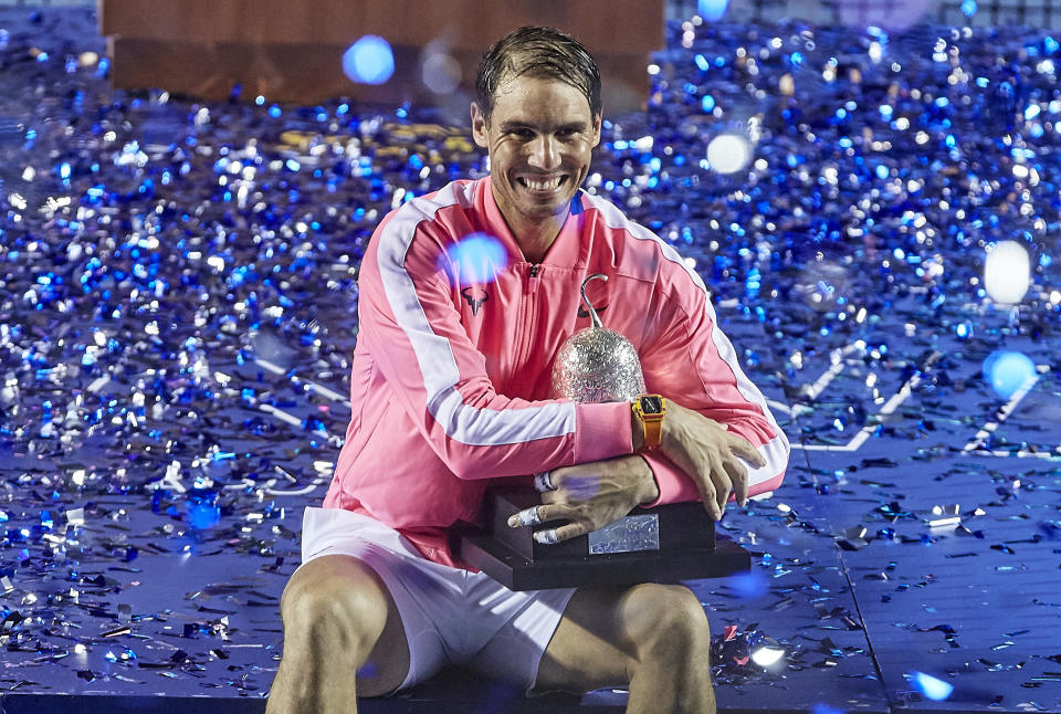 ACAPULCO, MEXICO - FEBRUARY 29: Rafael Nadal of Spain celebrates with the trophy after winning Mexican Open against Taylor Fritz of United States during day six of the ATP Mexican Open 2020 at Princess Mundo Imperial on February 29, 2020 in Acapulco, Mexico. (Photo by Quality Sport Images/Getty Images)