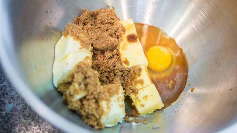 Brown sugar, butter, and egg in bowl