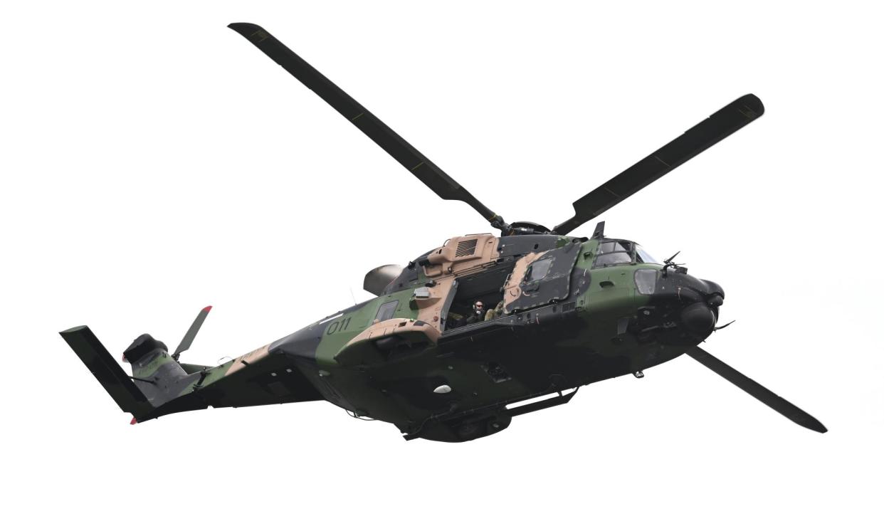 <span>An Australian Army (ADF) MRH-90 Taipan Battlefield Mobility helicopter seen on a flypast in 2022. A report said the failure of an HP1 blade – previously raised by the manufacturer as a risk – caused ‘the catastrophic, but contained, engine failure’ in a 2023 Jervis Bay incident.</span><span>Photograph: Darren England/AAP</span>