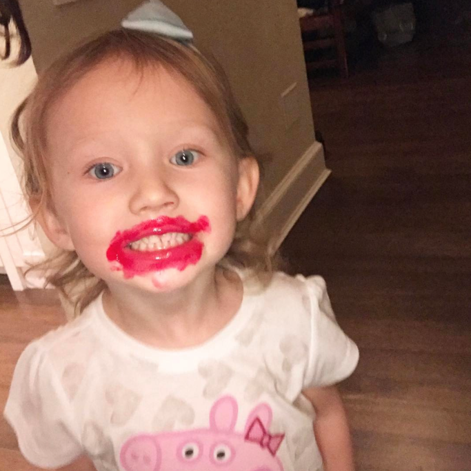 Carmen Baldwin loves playing with her mommy's makeup. (Photo: Instagram)