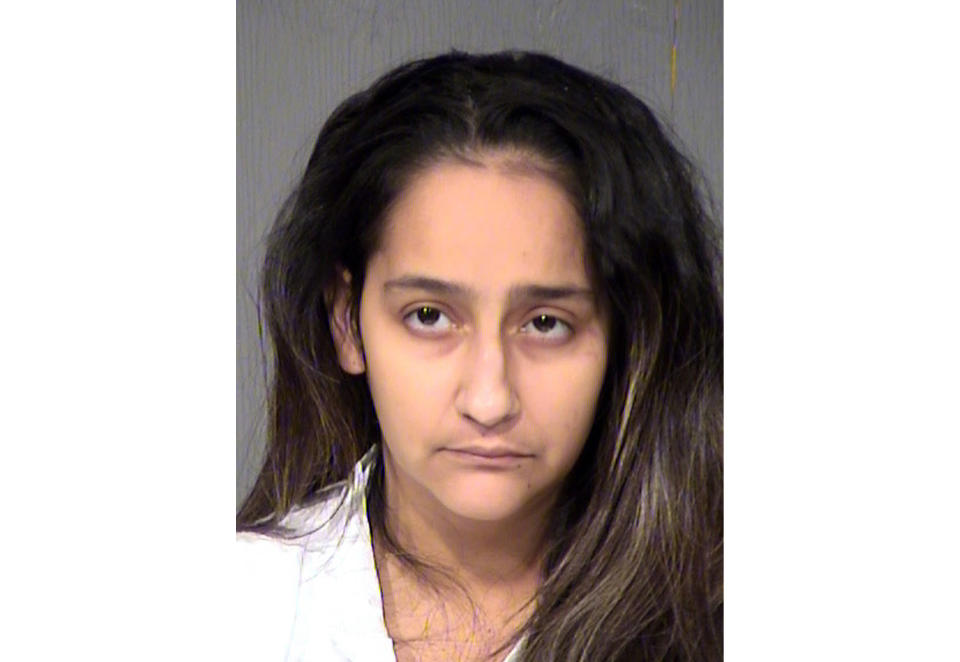 FILE - This undated file booking photo provided by the Maricopa County Sheriff shows Wendy Lavarnia. Lavarnia, who says her 2-year-old son fatally shot her 9-year-old son with a handgun that she left on a bed faces sentencing for her role in the 2017 killing. Lavarnia will face 10 to 16 years in prison Thursday, Oct. 3, 2019 after being convicted of manslaughter in the death of her son, Landen.(Maricopa County Sheriff via AP, File)