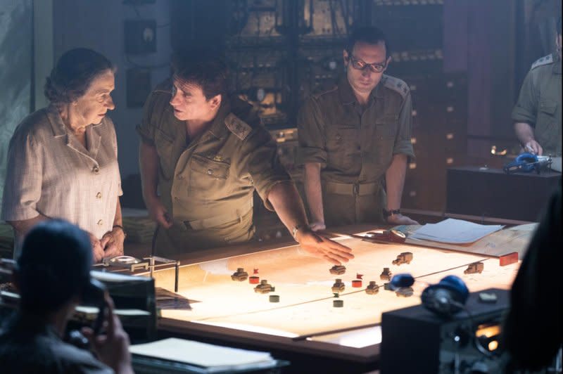 From left, Golda Meir (Helen Mirren) receives an update from David Elazar (Lior Ashkenazi). Photo courtesy of Bleecker Street/ShivHans Pictures