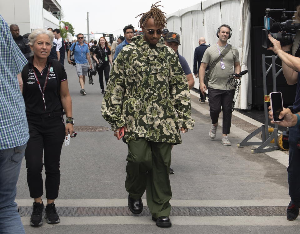 Mercedes driver Lewis Hamilton walks through the paddock at the Formula 1 Canadian Grand Prix auto race, Thursday, June 16, 2022 in Montreal. (Ryan Remiorz/The Canadian Press via AP)