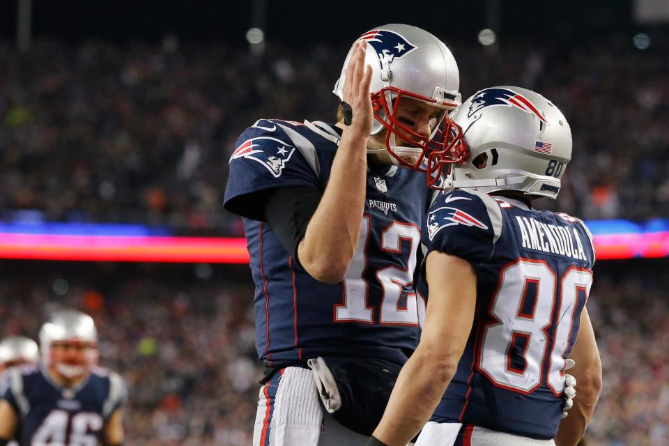 Patriot gains: Brady and Amendola celebrate the winning touchdown: Getty Images