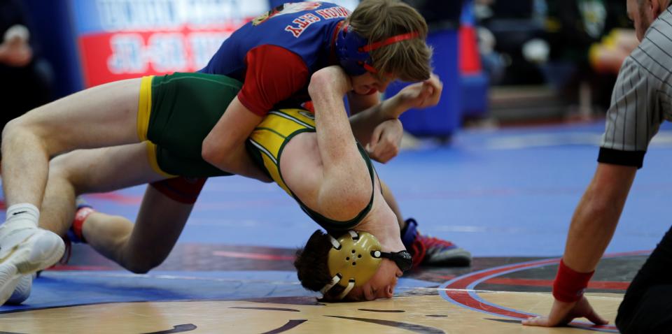 Northeastern's Jackson Ramsey and Union City's Bradin Daniels wrestle in the finals of the Tri-Eastern Conference Tournament Jan. 22, 2022.