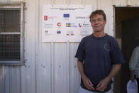 Sven Kühn von Burgsdorff, the European Union's representative to the West Bank and Gaza, talks to reporters during the European Union representatives visit to a school structure that is under the threat of demolition by the Israeli authorities, in the West Bank Bedouin community of Ein Samia, northeast of Ramallah, Friday, Aug. 12, 2022. The Israeli District Court in Jerusalem issued on Wednesday, Aug. 10, a decision to immediately demolish the Ein Samia school. Fifty four schools serving seven thousand Palestinian children in the West Bank's area "C" are under threat of demolition, Von Burgsdorff told reporters. (AP Photo/Nasser Nasser)