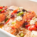 <p>We love this meal because it comes with lots of veggies! If you want to be extra-healthy, serve the salmon over a bed of rocket or spinach.</p><p>Get the <a href="https://www.delish.com/uk/cooking/recipes/a29205150/greek-salmon-recipe/" rel="nofollow noopener" target="_blank" data-ylk="slk:Greek Salmon;elm:context_link;itc:0;sec:content-canvas" class="link ">Greek Salmon</a> recipe. </p>