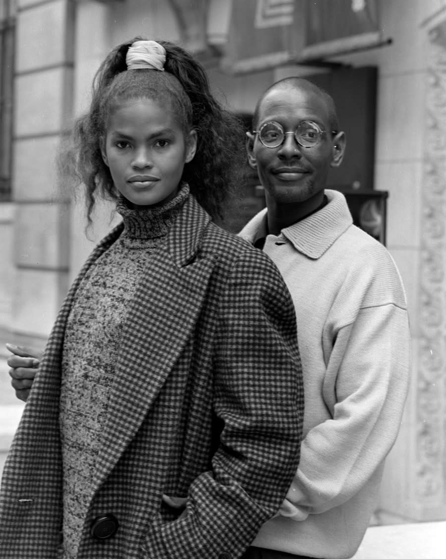 Model Gail O’Neill poses with designer Willi Smith in his last fall collection. (Photo by Thomas Iannaccone/WWD/Penske Media via Getty Images)