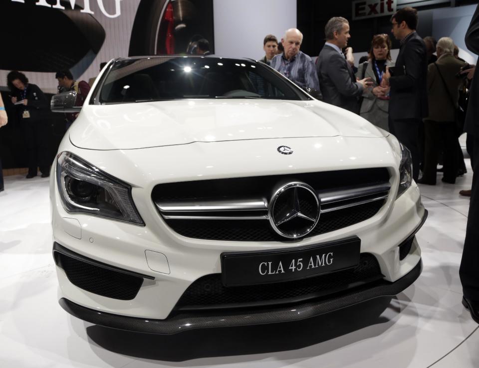 FILE - In this March 27, 2013 file photo, the 2014 CLA 45 AMG Mercedes-Benz is presented at the New York International Auto Show, in the Javits Center, in New York. The CLA 45 AMG all-wheel-drive with 355 horses goes on sale in November. (AP Photo/Richard Drew, File)