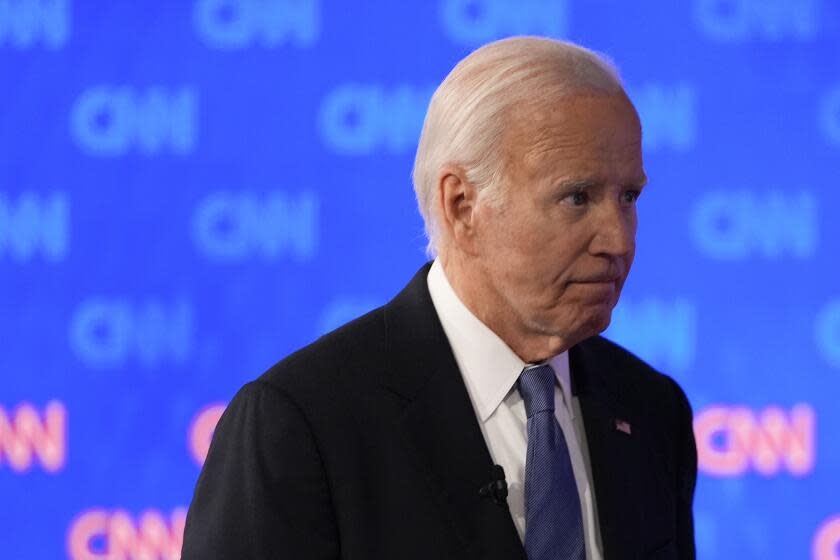 President Joe Biden walking off stage at a commercial break during a presidential debate with Republican presidential candidate former President Donald Trump, Thursday, June 27, 2024, in Atlanta. (AP Photo/Gerald Herbert)