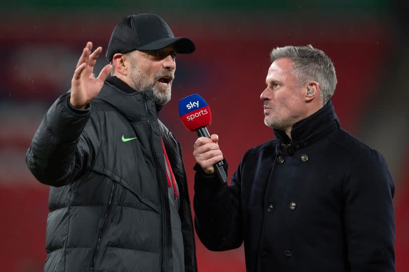 Liverpool manager Jürgen Klopp is interviewed by Sky Sports commentator Jamie Carragher during the Carabao Cup Final match between Chelsea and Liverpool at Wembley Stadium on February 25, 2024 in London, England.