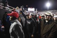 Texas Tech coach Joey McGuire leaves the field after Texas Tech defeated Oklahoma in overtime in an NCAA college football game Saturday, Nov. 26, 2022, in Lubbock, Texas. (AP Photo/Justin Rex)