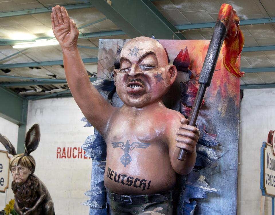 A figure depicting a German nazi is shown during a press preview in a hall of the Mainz carnival club in Mainz, Germany, Feb. 26, 2019. (Photo: Michael Probst/AP)