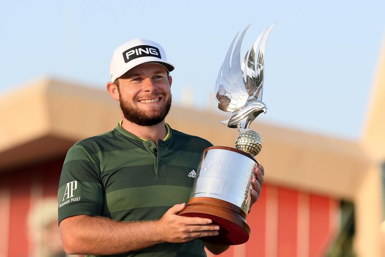 <p>Champion: Tyrrell Hatton overhauled Rory McIlroy to win the Abu Dhabi Championship</p> (Getty Images)