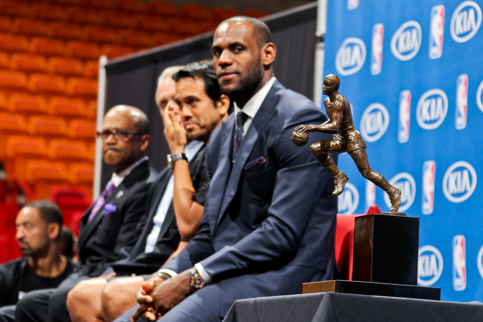 MIAMI, FL - MAY 5: LeBron James #6 of the Miami Heat looks towards the Maurice Podoloff Trophy, which was given to him for being named the 2012-2013 Kia NBA Most Valuable Player (MVP) of the Year, on May 5, 2013 at American Airlines Arena in Miami, Florida.