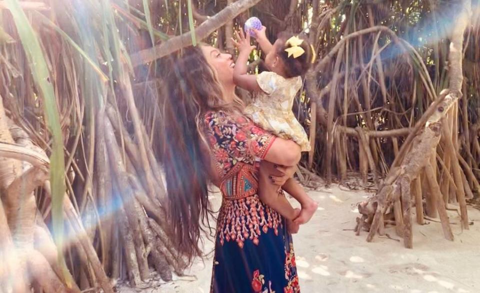 Beyoncé poses with with Rumi in India. [Photo: Beyonce.com]