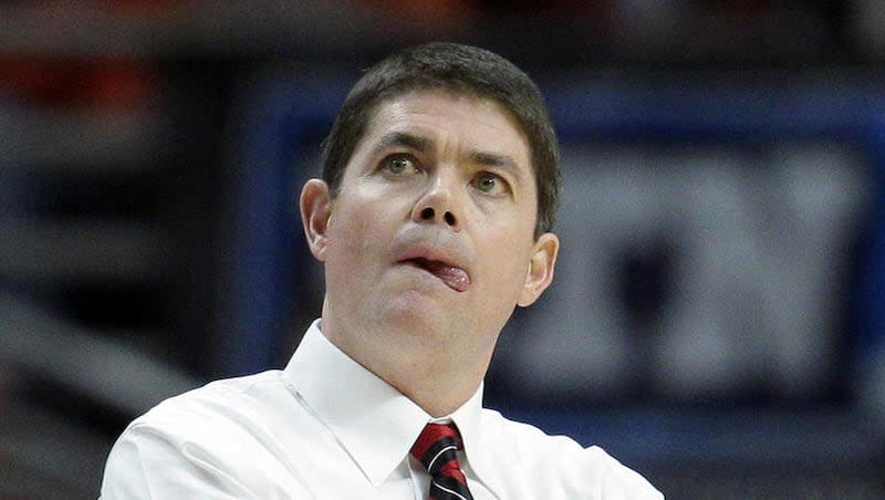 Nevada head coach Dave Rice reacts during the first half of an NCAA college basketball game against Illinois in Chicago on Saturday, Dec. 17, 2011.