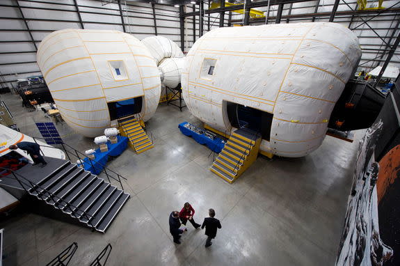 NASA Deputy Administrator Lori Garver is given a tour of the Bigelow Aerospace facilities by the company’s President Robert Bigelow back in Feb. 2011, in Las Vegas. NASA has been discussing potential partnership opportunities with Bigelow for i