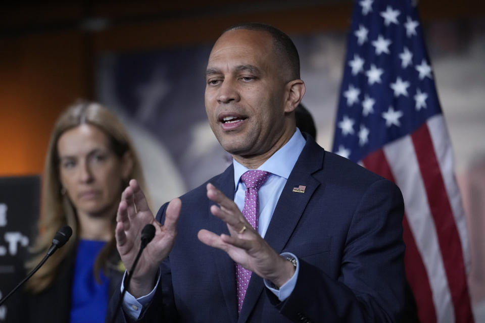House Minority Leader Hakeem Jeffries, D-N.Y., joined by fellow Democrats, speaks with reporters about the political brinksmanship over the debt ceiling negotiations, at the Capitol in Washington, Thursday, May 25, 2023. Democrats have balked at Republican efforts to tighten work requirements for social safety net programs. (AP Photo/J. Scott Applewhite)