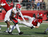 Rutgers quarterback Noah Vedral (0) goes down after a hit by Maryland defensive back Jordan Mosley (18) during the first half of an NCAA football game, Saturday, Nov. 27, 2021, in Piscataway, N.J. (AP Photo/Noah K. Murray)