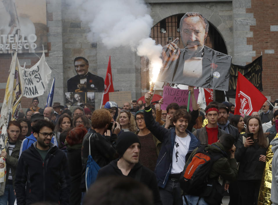 People attend a rally to oppose a rally organized by League leader Matteo Salvini, with leaders of other European nationalist parties, ahead of the May 23-26 European Parliamentary elections, in Milan, Italy, Saturday, May 18, 2019. (AP Photo/Antonio Calanni)