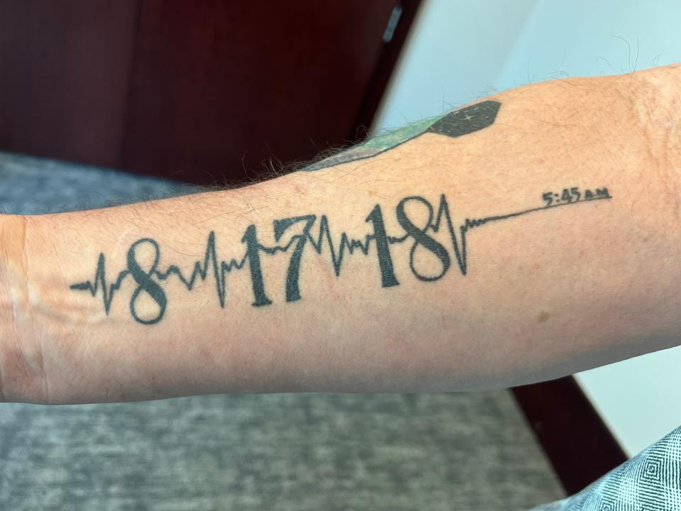 Bartley Teal tattooed the time of his son's death, the early morning of Aug. 17, 2018, on his right arm.